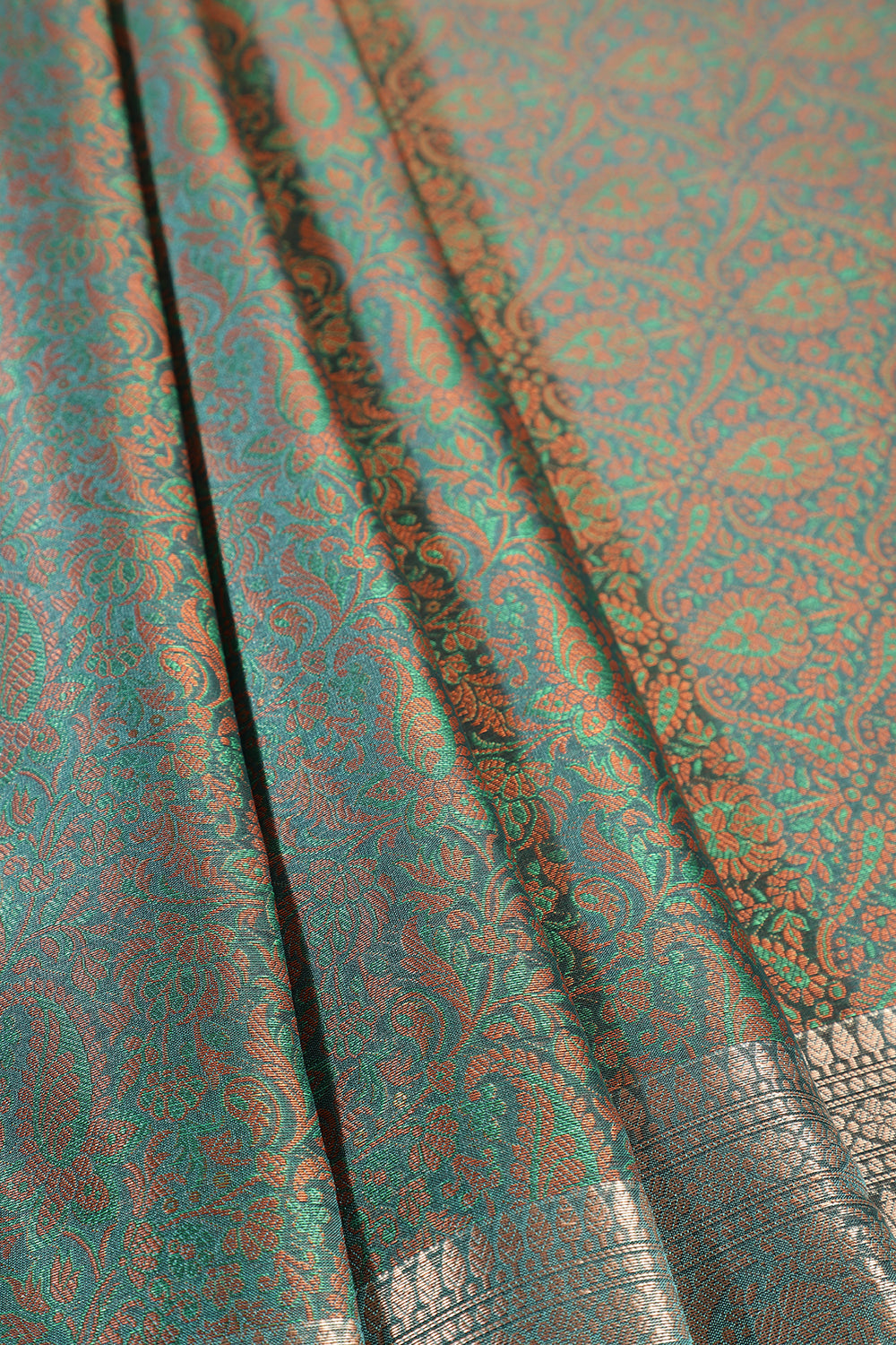 Teal Green Silk Floral and Paisley Resham & Zari Woven Saree