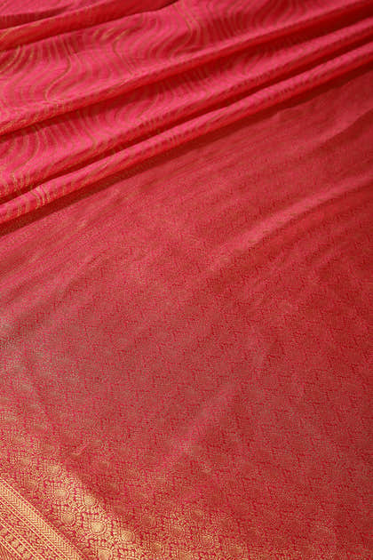 Fuchsia Pink Color Soft Silk Leheria Zari Woven Saree