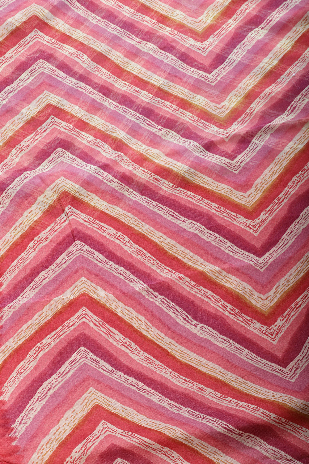 Coral Pink Chiffon Lehariya Printed Saree