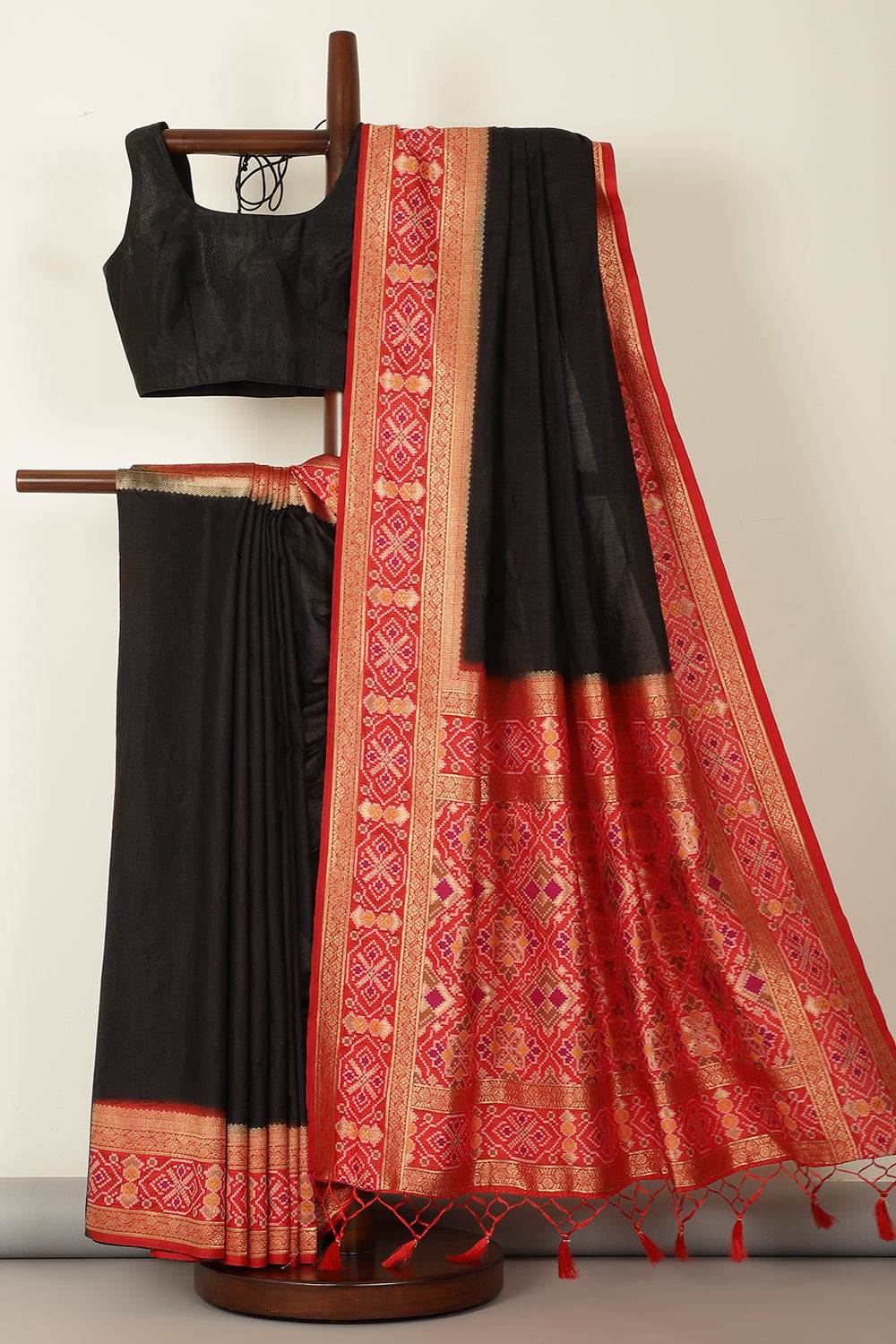 Black & Green Dual Toned Tussar Silk Patola Woven Saree