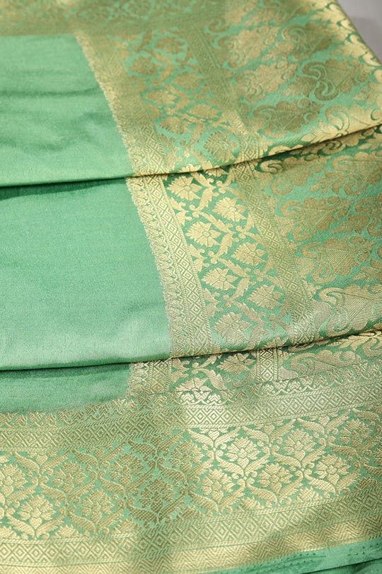 Dusty Green Colour Silk Woven Saree