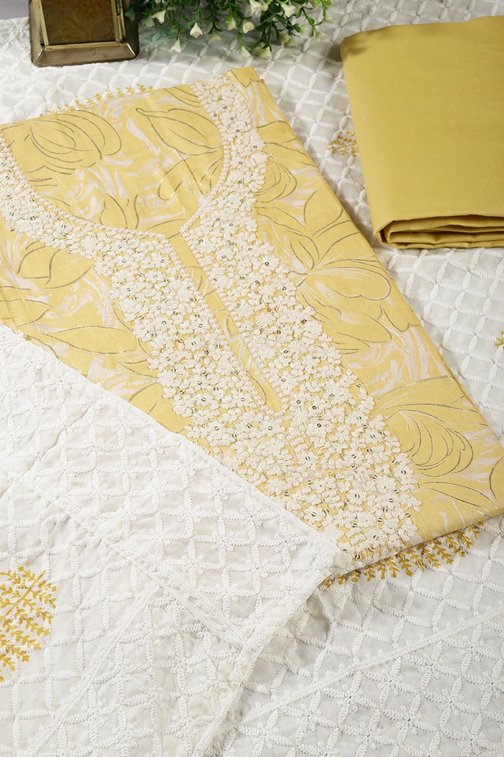 Pale Yellow Colour Cotton Printed & Resham Neck Embroidered Unstitched Suit