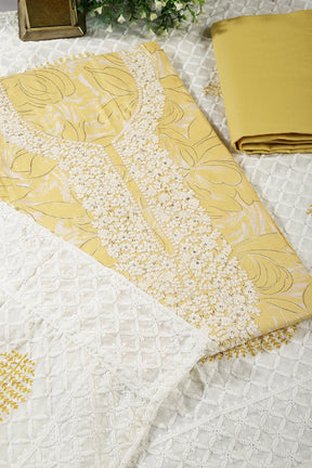 Pale Yellow Colour Cotton Printed & Resham Neck Embroidered Unstitched Suit