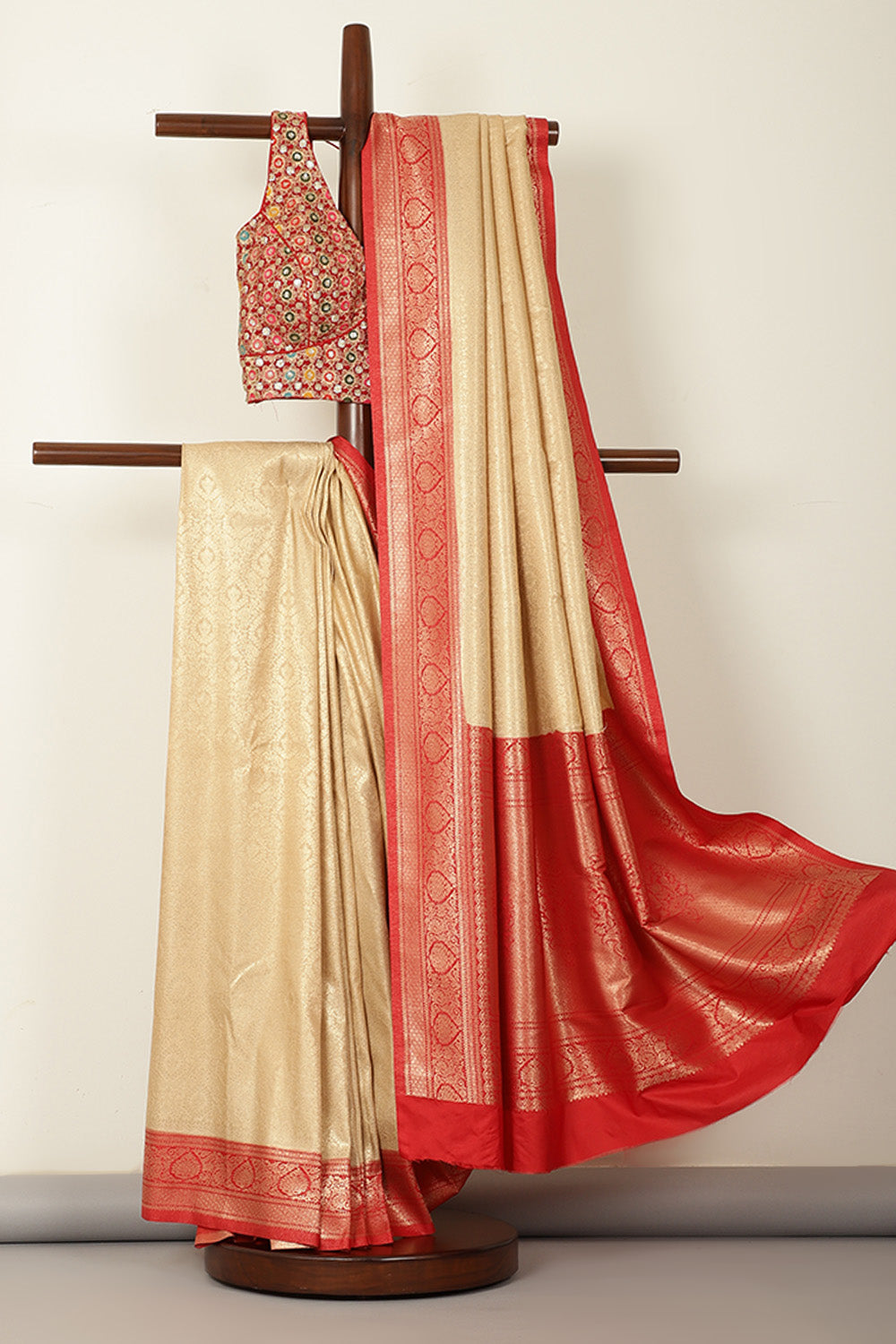 Beige & Red Dual Toned Soft Silk Zari Woven Saree