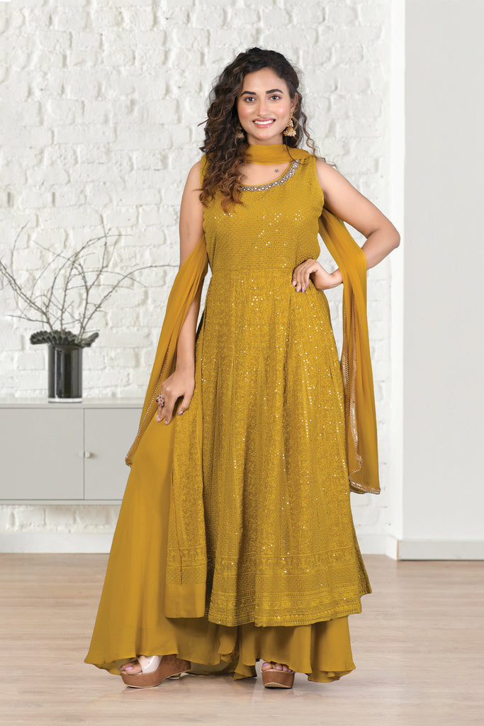 Mustard Color Embroidered Georgette Sharara Suit.