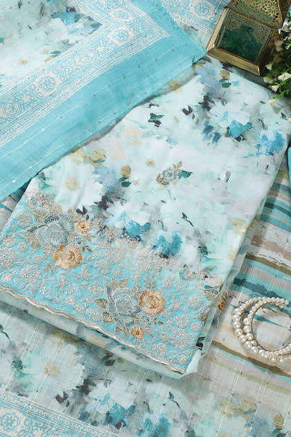 Turquoise Cotton Floral Printed And Hemline Embroidered Unstitched Suit