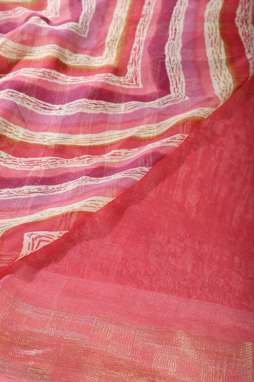 Coral Pink Chiffon Lehariya Printed Saree