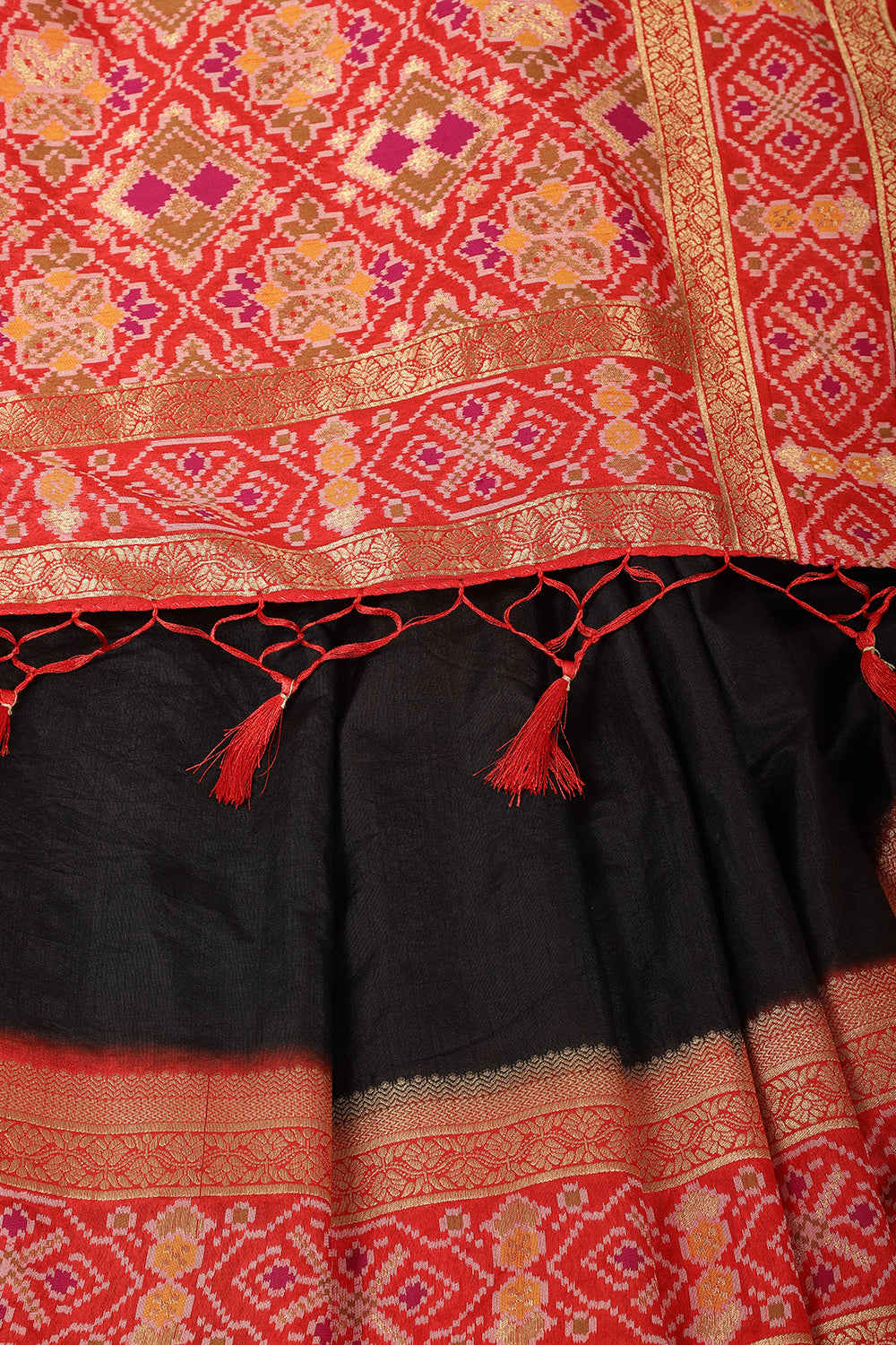 Black & Green Dual Toned Tussar Silk Patola Woven Saree