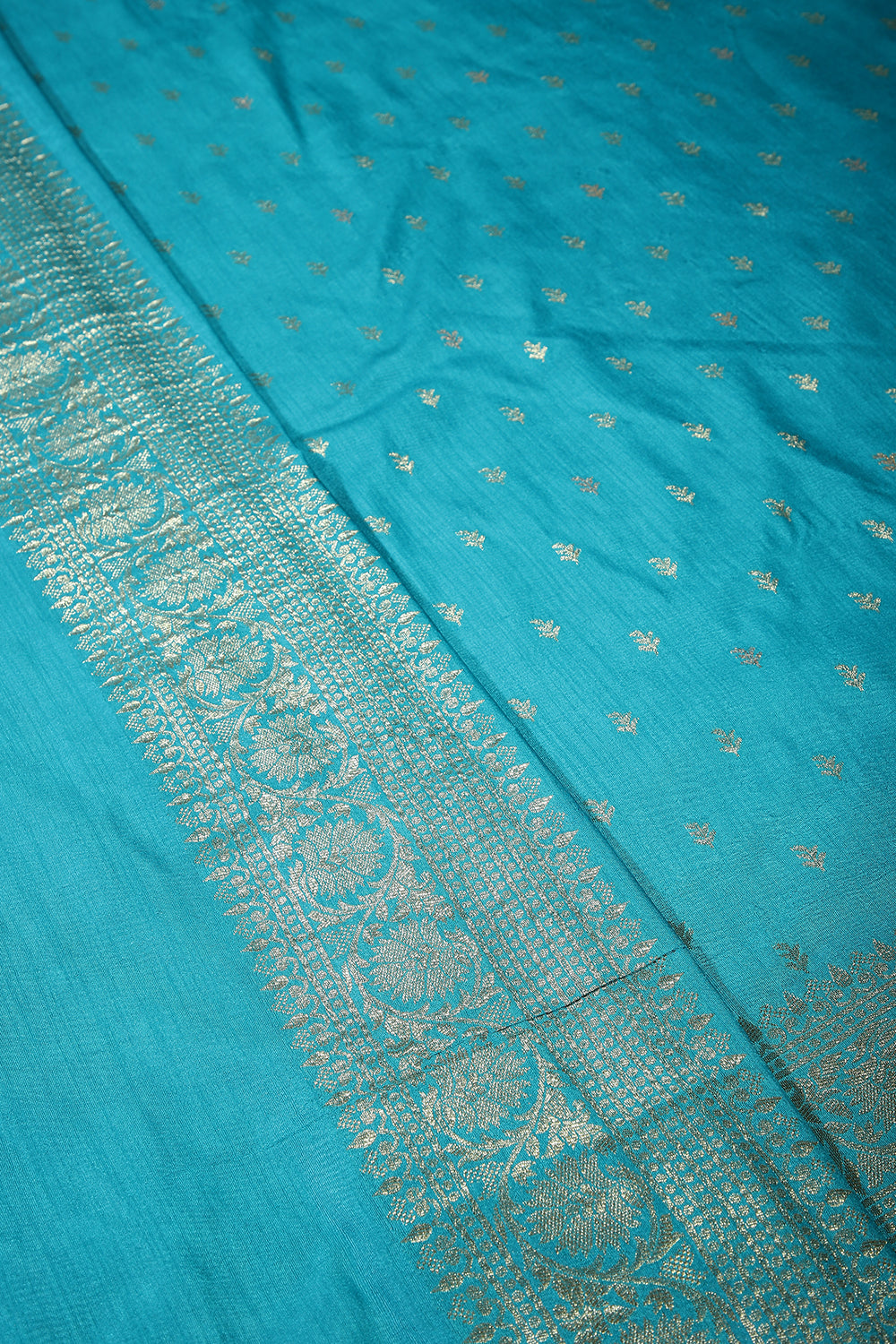 Turquoise Color Raw Silk Woven Saree