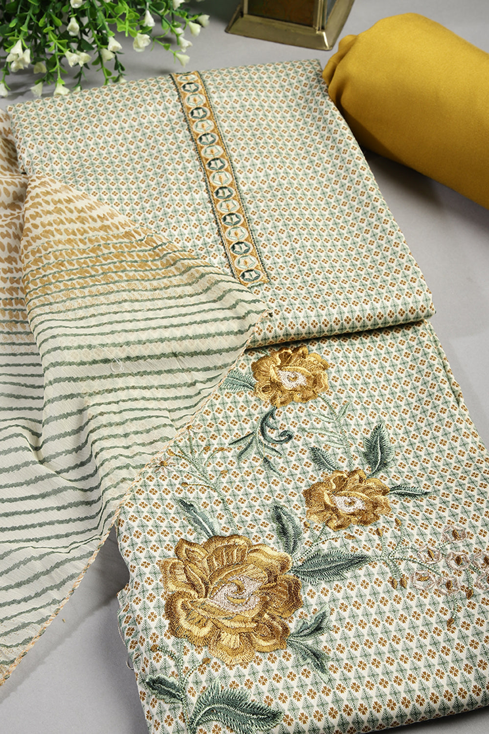 Mustard Color Printed And Resham Embroidered Unstitched Suit Material
