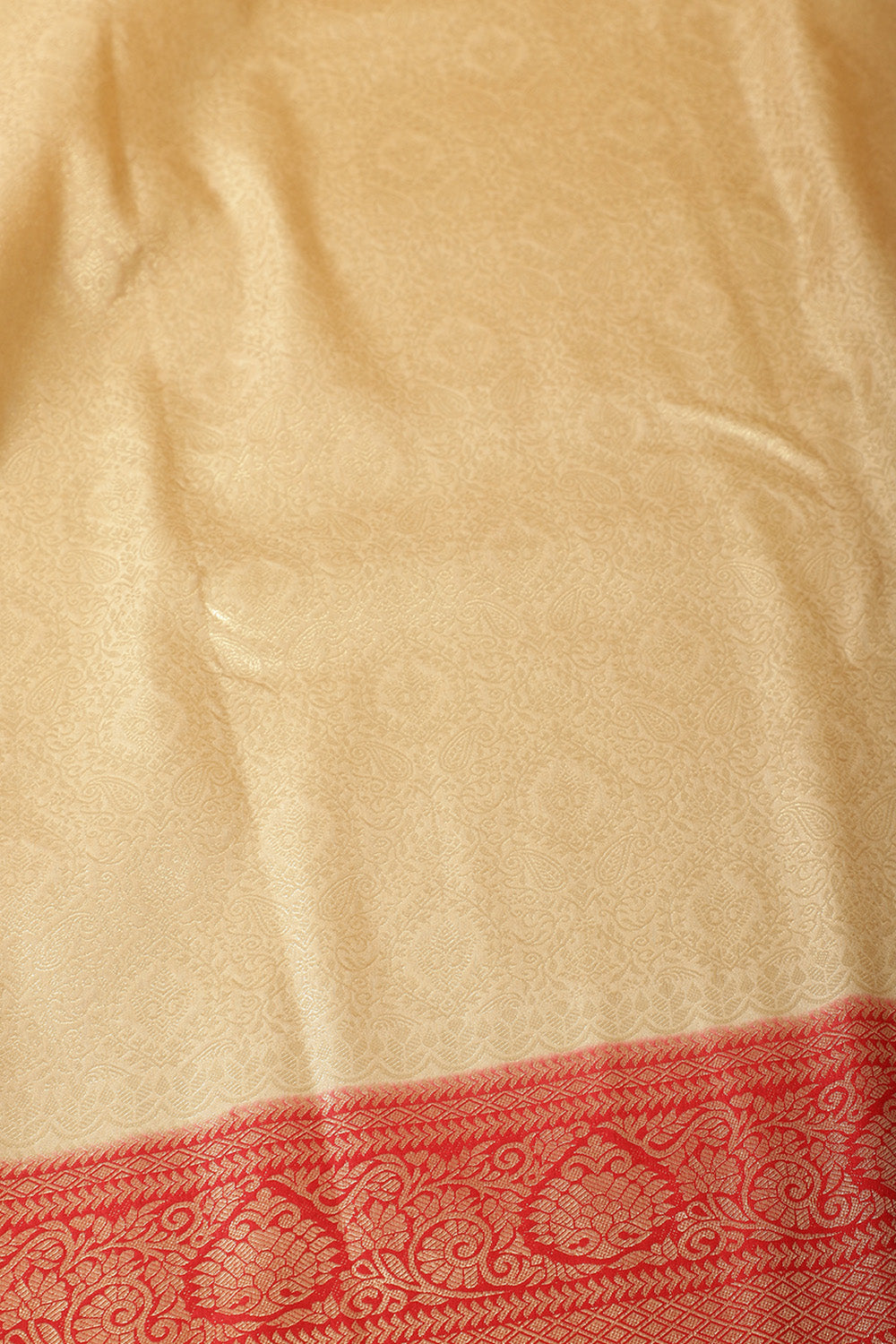 Beige & Red Dual Toned Soft Silk Zari Woven Saree