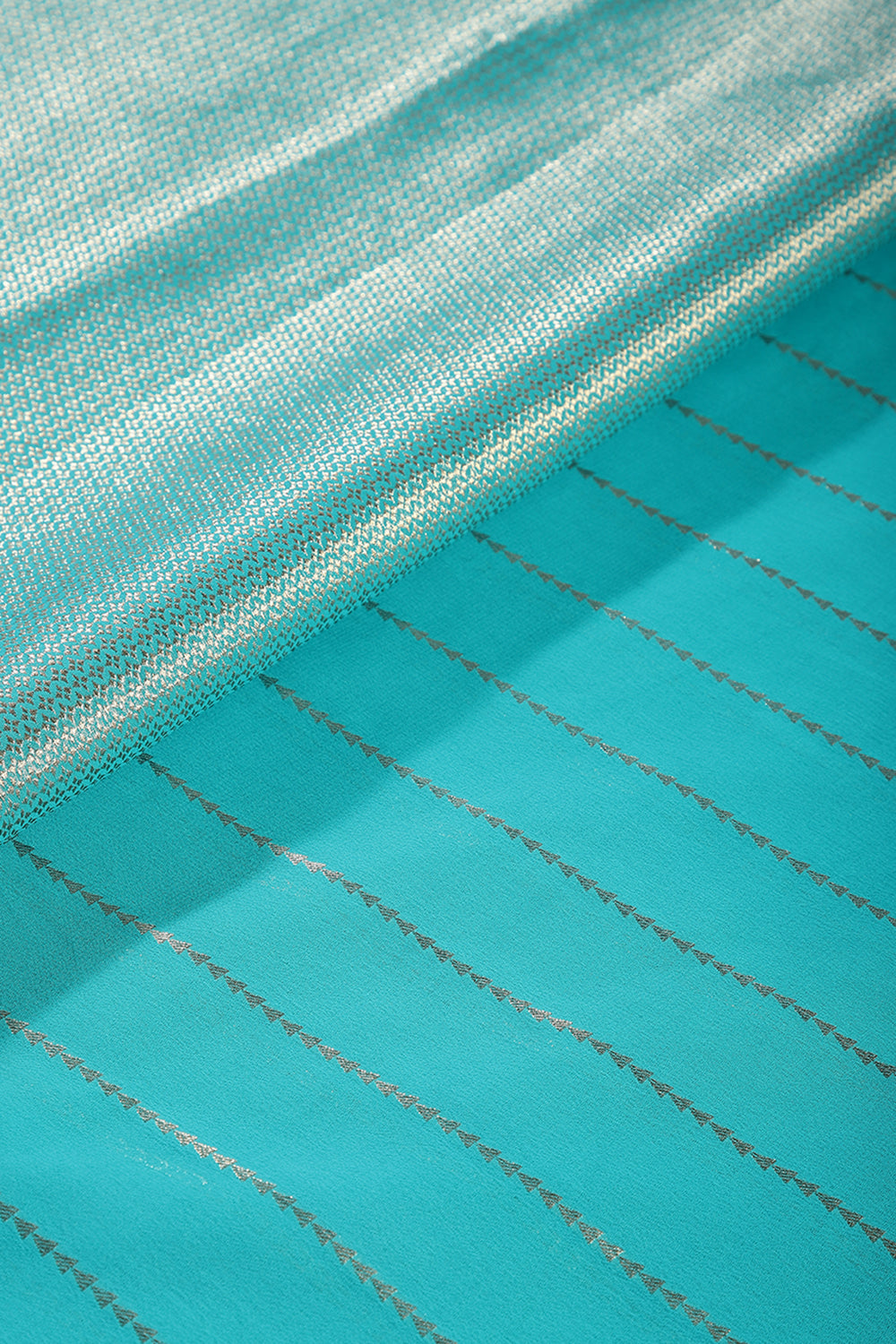 Firozi Color Georgette Saree with Zari Pinstripes