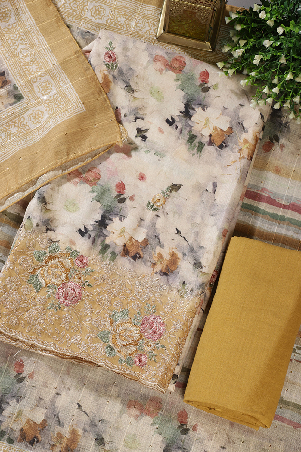 Mustard Cotton Floral Printed And Hemline Embroidered Unstitched Suit