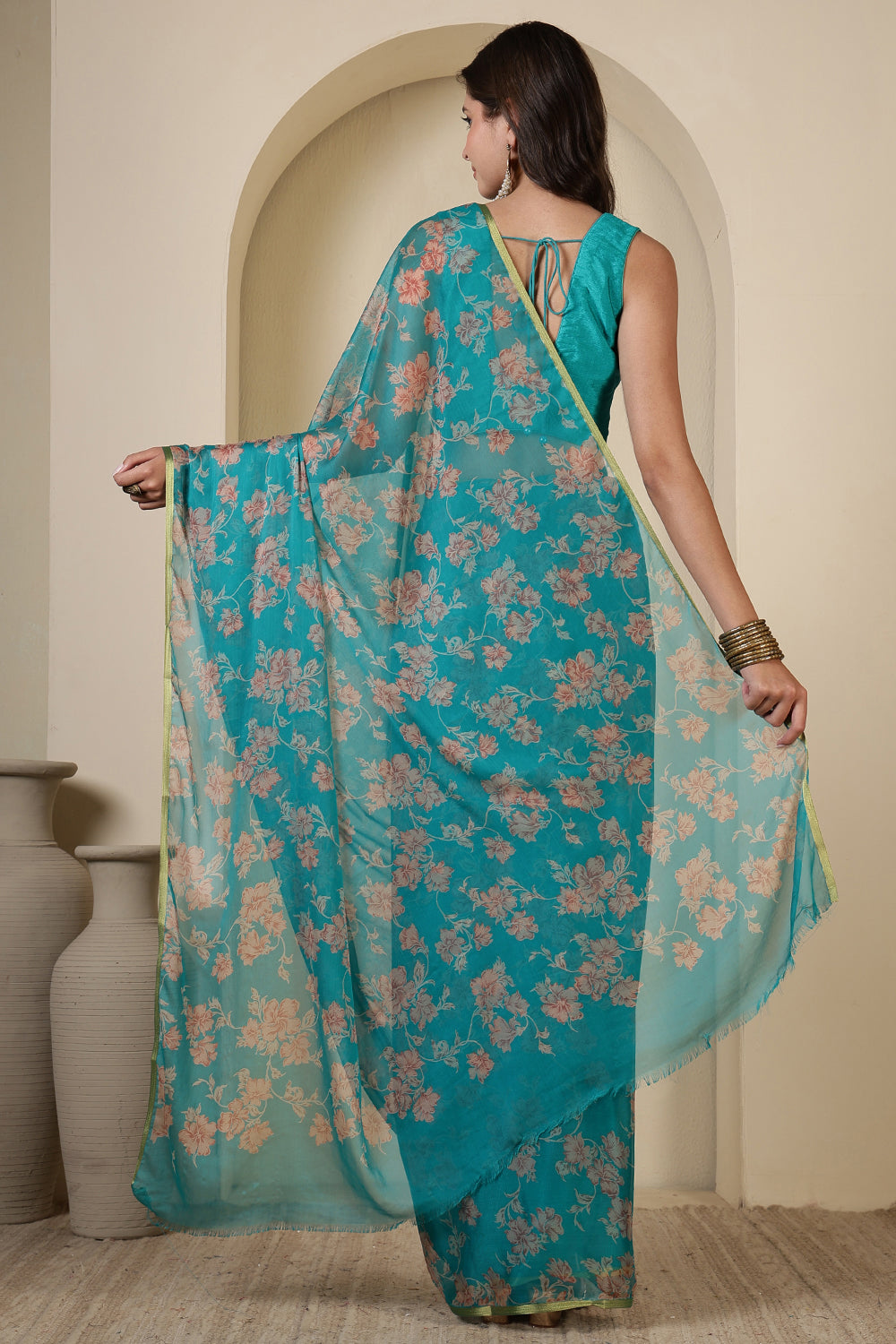 Turquoise  Chiffon Floral Zari Border & Floral Printed Saree