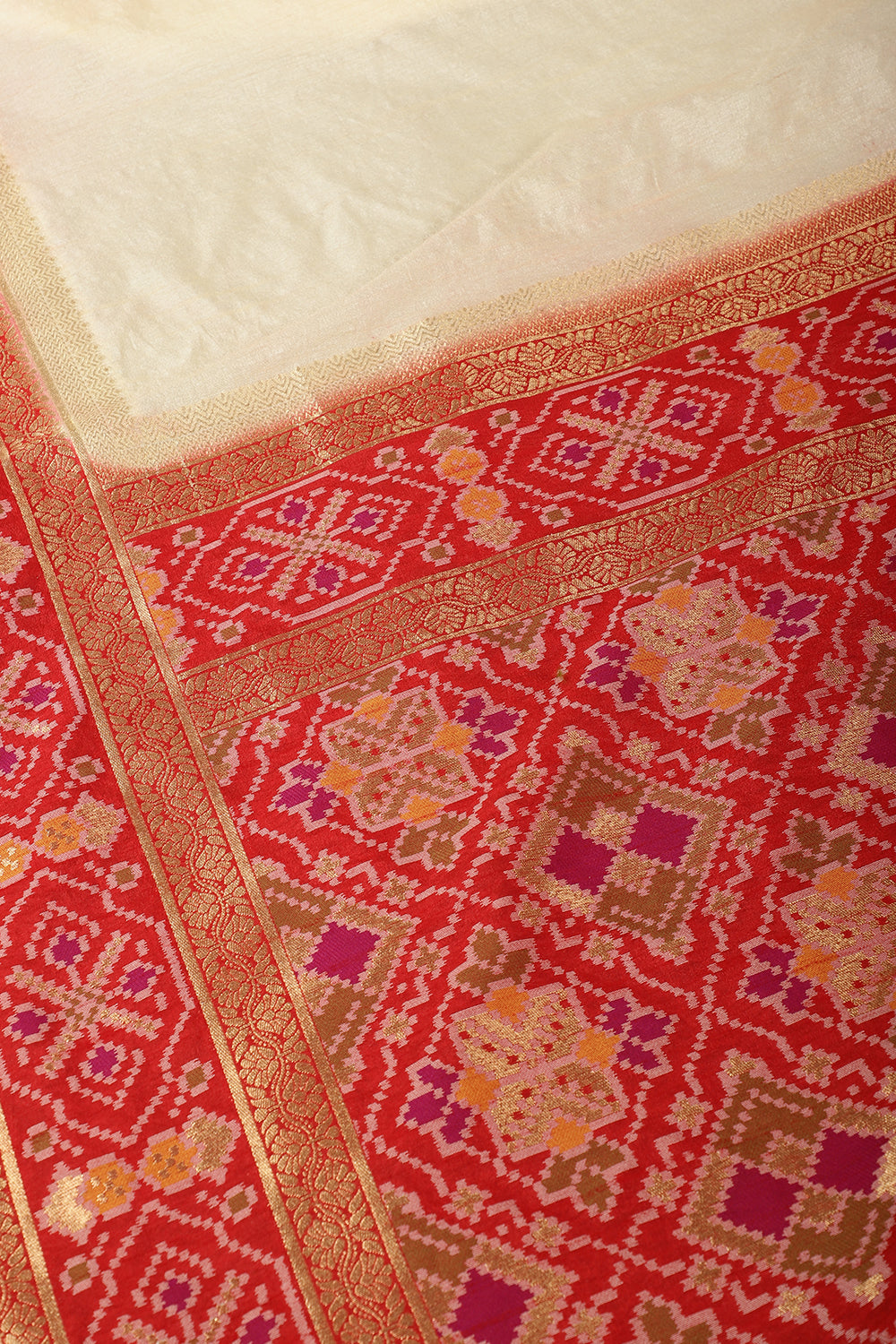 Cream & Red Dual Toned Tussar Silk Patola Woven Saree
