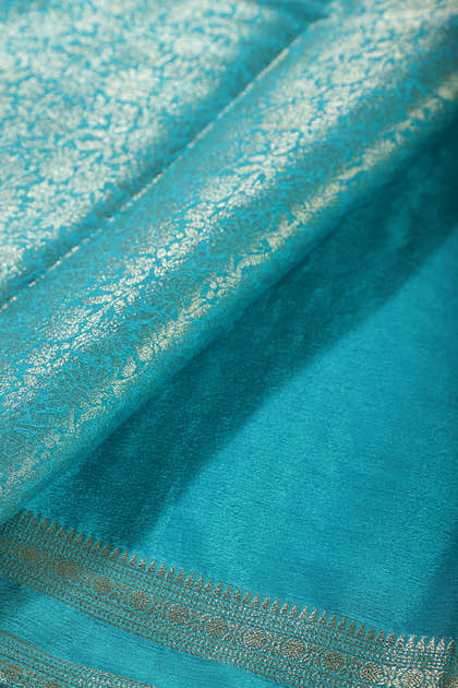 Teal Floral Zaal Zari Woven Crepe Silk Saree