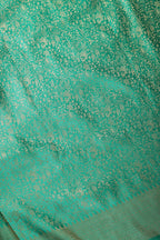 Teal Green Zari Woven Soft Silk Saree