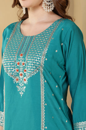 Turquoise Color Cotton Silk Printed & Neck Embroidered Suit