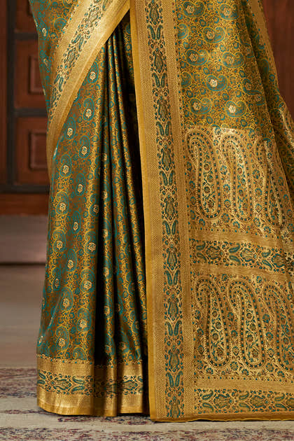 Teal Silk Minakari Woven Saree