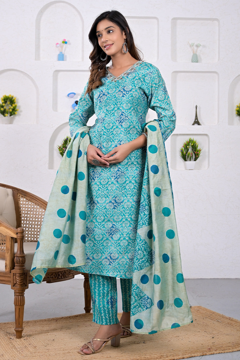 Turquoise Color Muslin Neck Embroidered Suit