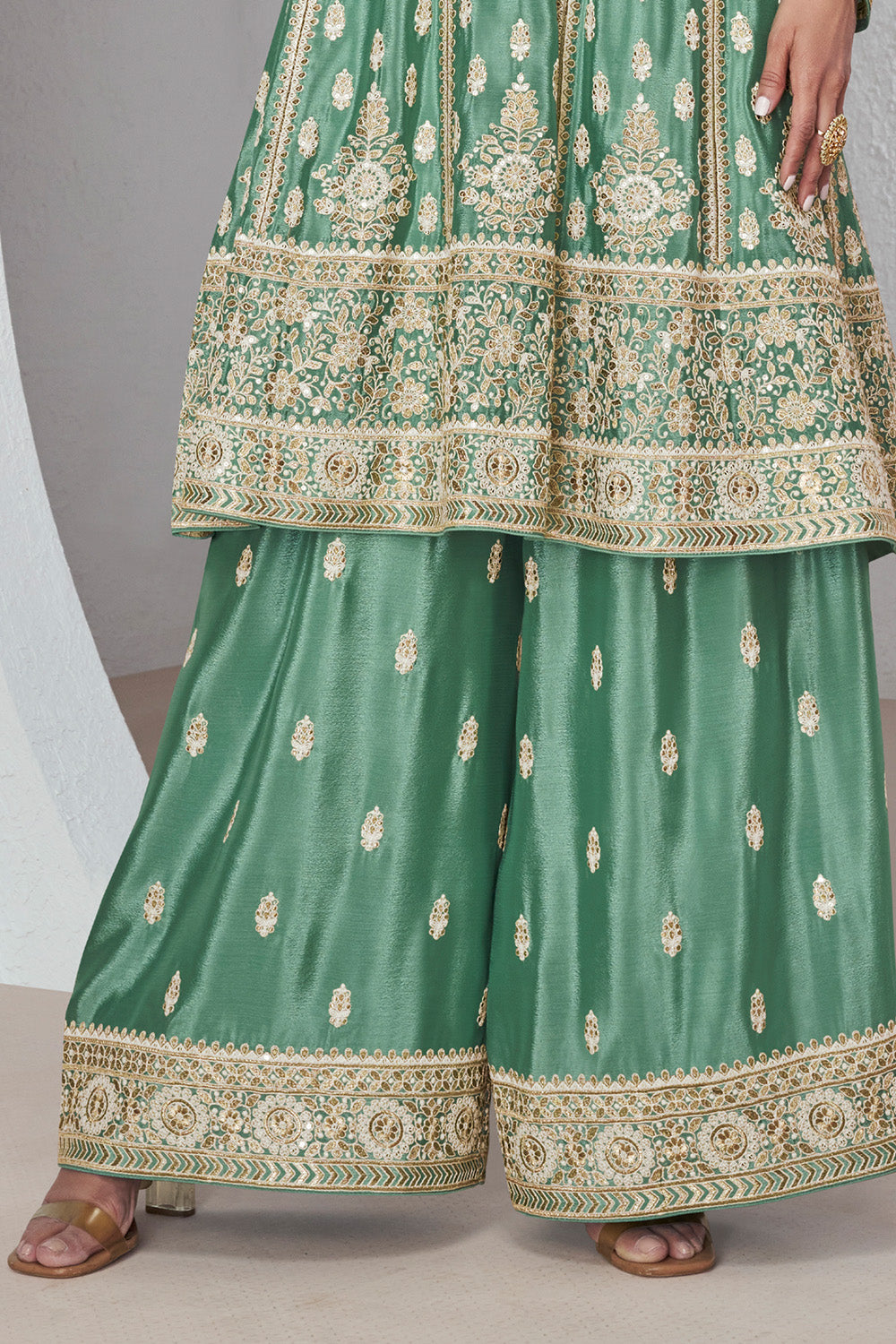 Sea Green Color Embroidered Crepe Silk Peplum Suit