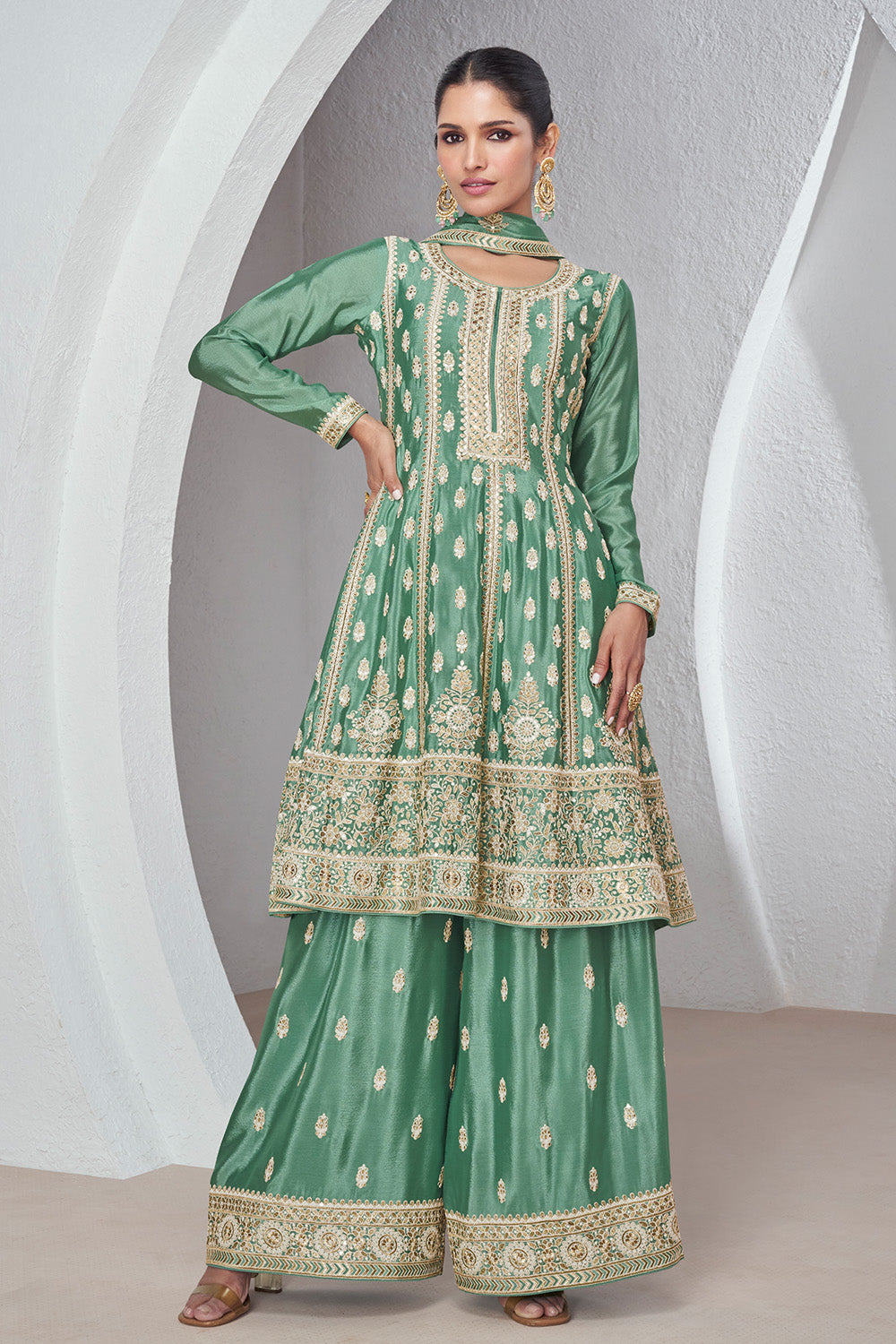 Sea Green Color Embroidered Crepe Silk Peplum Suit