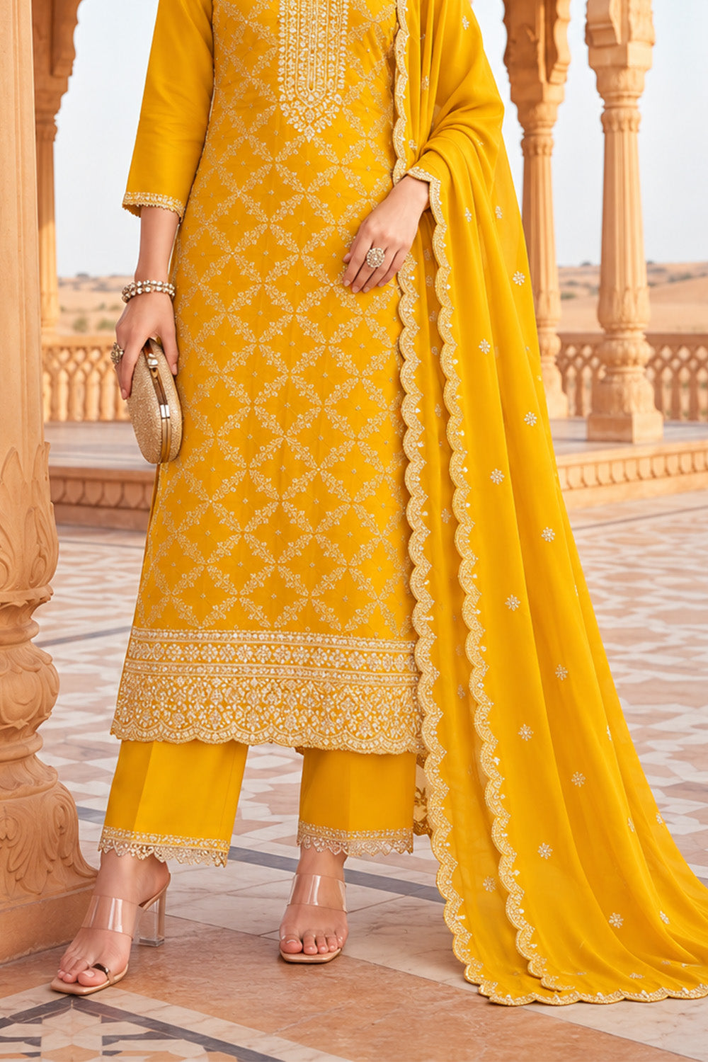 Yellow Crepe Silk Zari Woven And Embroidered Unstiched Suit Material