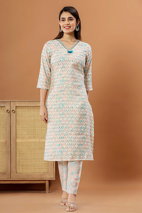 Cream & Turquoise Color Printed Muslin Straight Suit