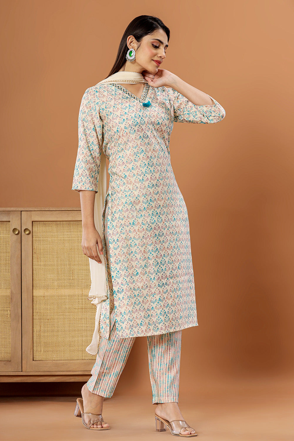 Cream & Turquoise Color Printed Muslin Straight Suit