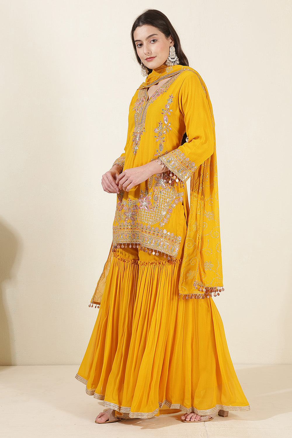 Mustard Color Georgette Embroidered Suit With Gharara