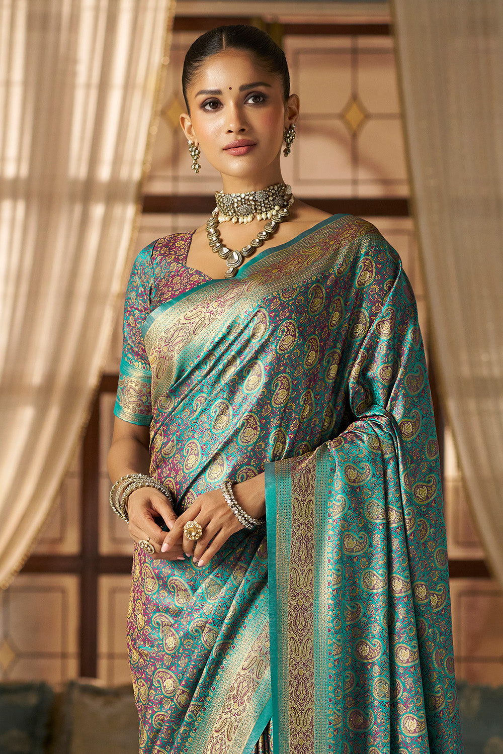 Teal Color Minakari Woven Silk Saree