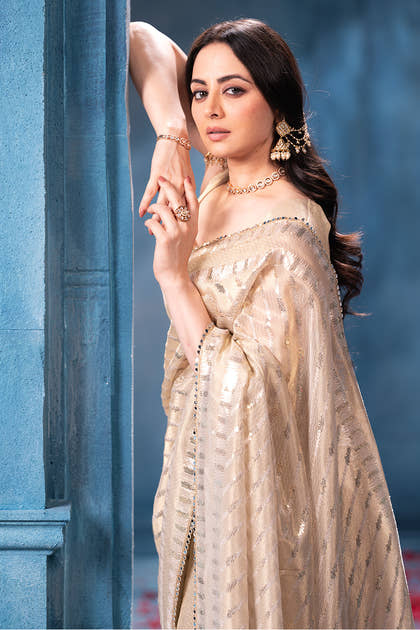 Cream Sequins and Resham Embroidered Metallic Tissue Saree