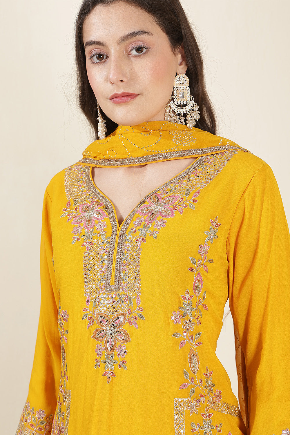 Mustard Color Georgette Embroidered Suit With Gharara
