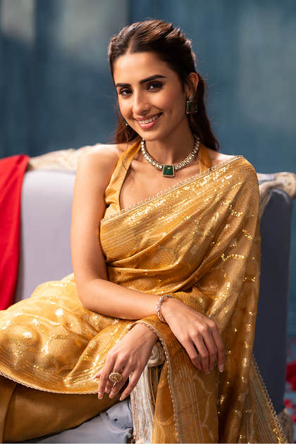 Golden Sequins and Resham Embroidered Metallic Tissue Saree