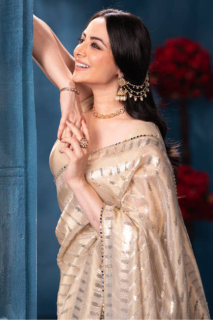 Cream Sequins and Resham Embroidered Metallic Tissue Saree
