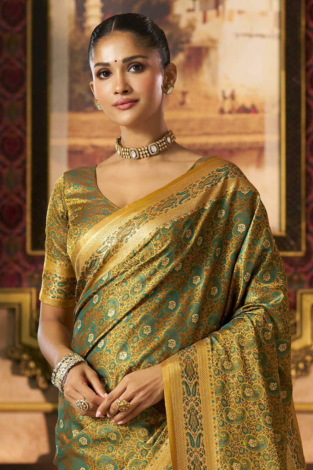 Teal Silk Minakari Woven Saree