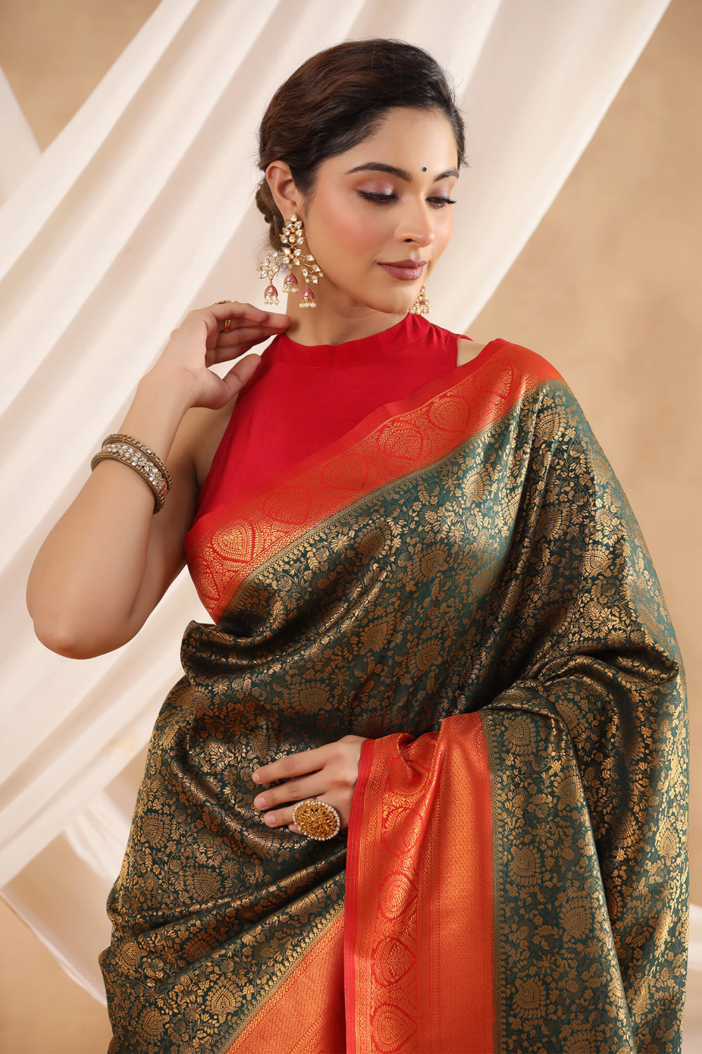 Bottle Green Color Zari Woven Silk Saree