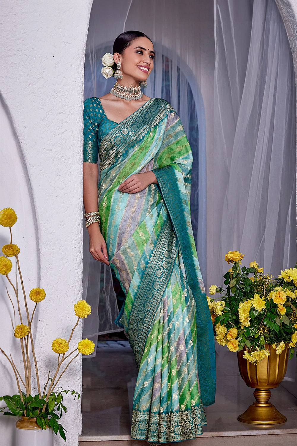 Turquoise Color Khhadi Georgette Woven Saree