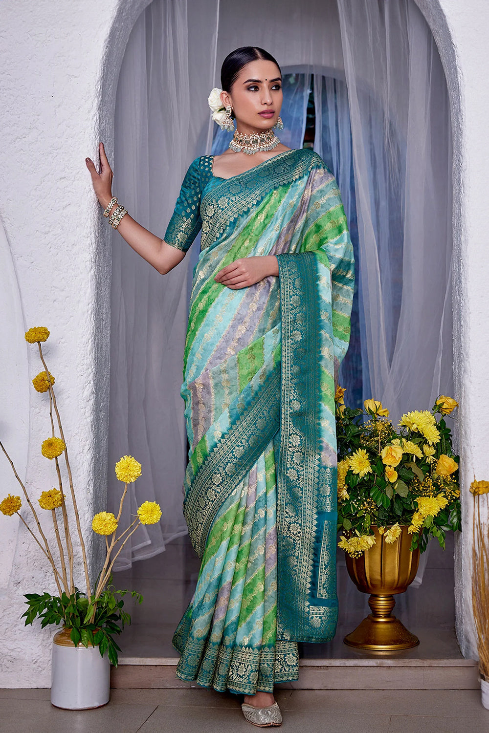 Turquoise Color Khhadi Georgette Woven Saree