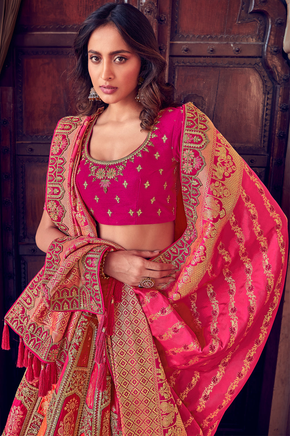 Fuchsia Pink Color Silk Embroidered Unstitched Lehenga.