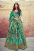 Teal & Turquoise Color Silk Embroidered Unstitched Lehenga.