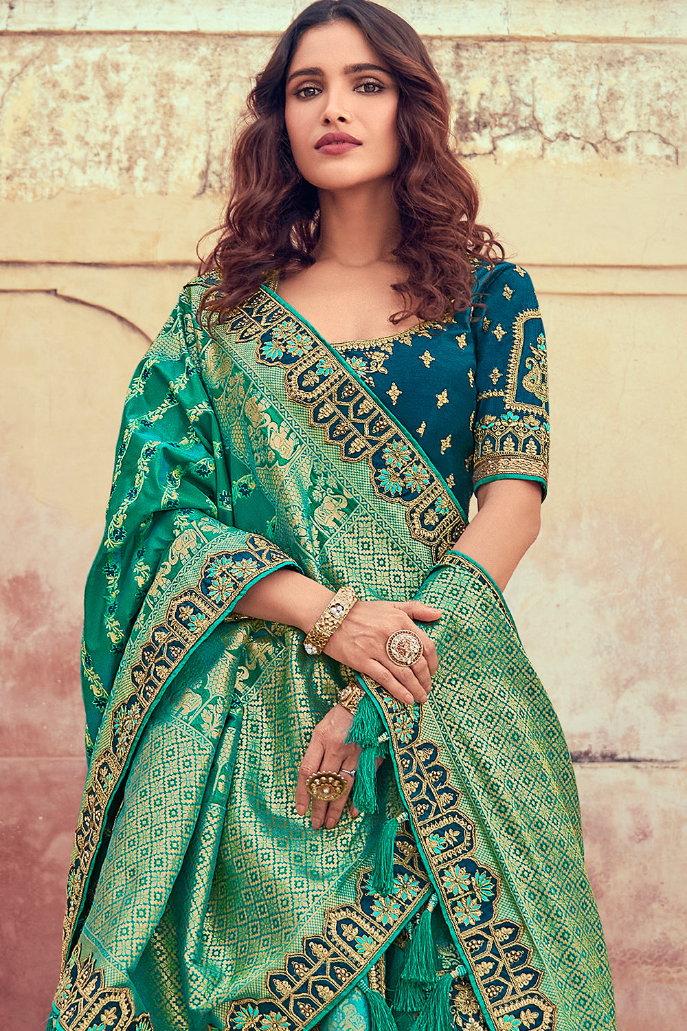 Teal & Turquoise Color Silk Embroidered Unstitched Lehenga.