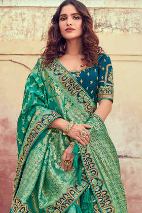 Teal & Turquoise Color Silk Embroidered Unstitched Lehenga.