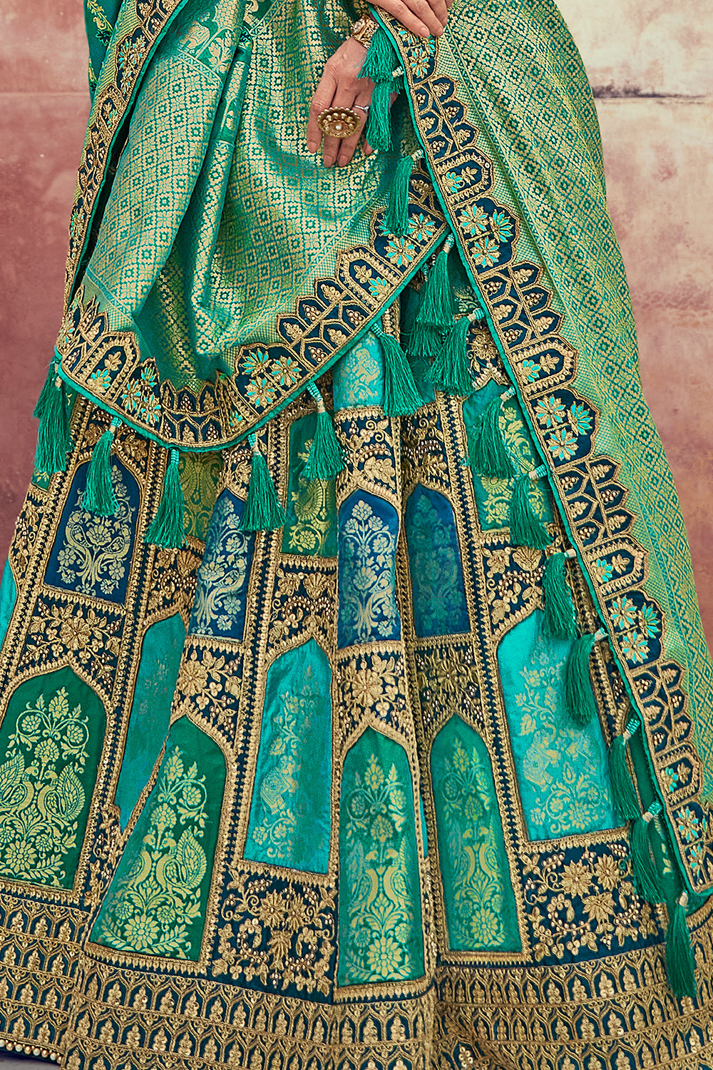 Teal & Turquoise Color Silk Embroidered Unstitched Lehenga.