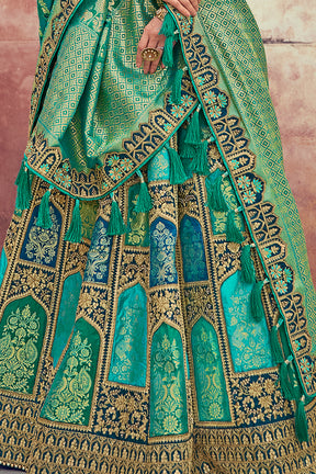 Teal & Turquoise Color Silk Embroidered Unstitched Lehenga.