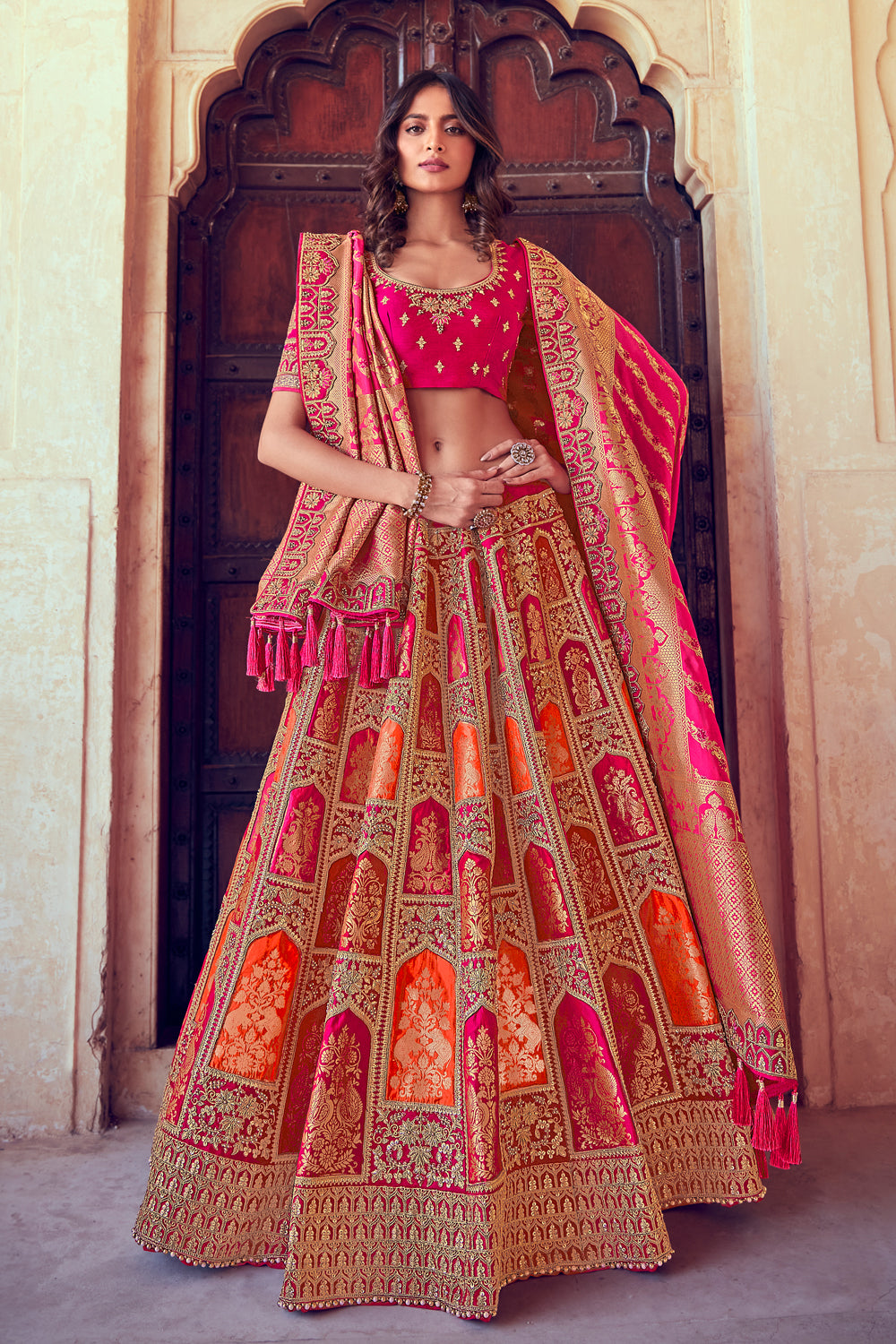 Fuchsia Pink Color Silk Embroidered Unstitched Lehenga.