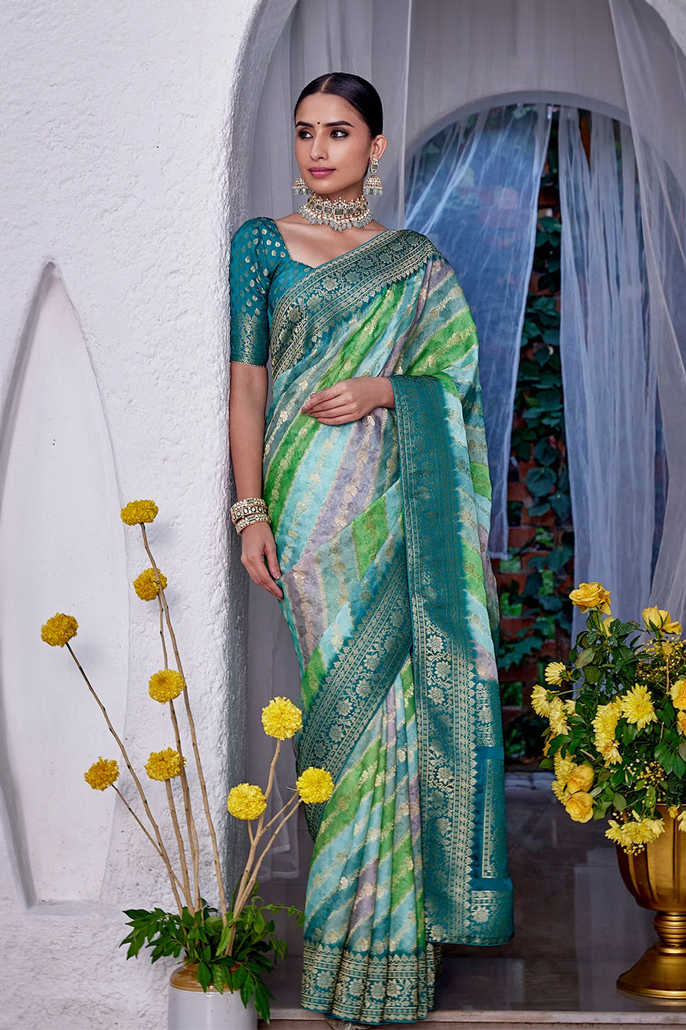 Turquoise Color Khhadi Georgette Woven Saree