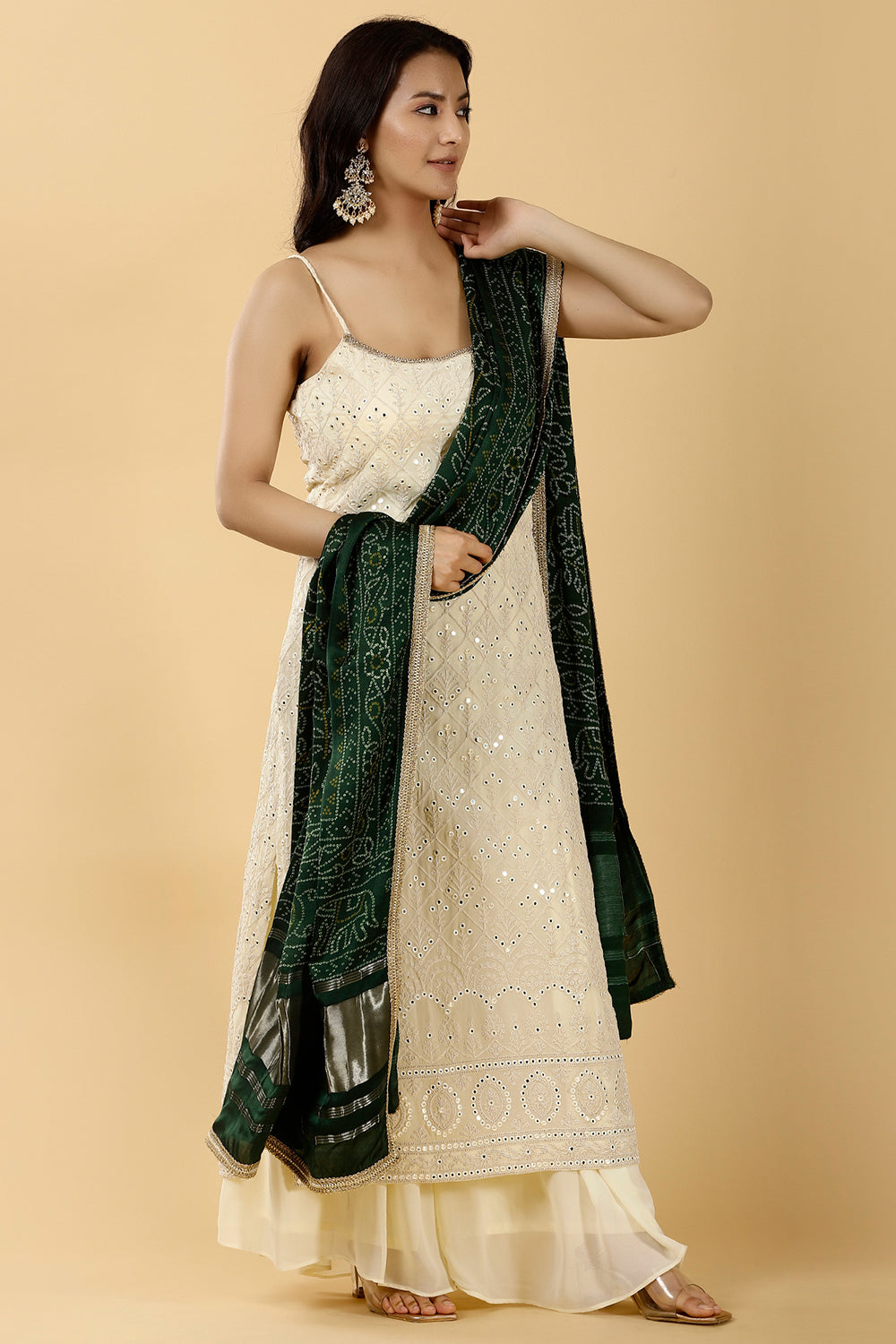 Cream Color Embroidered Georgette Sharara Suit.