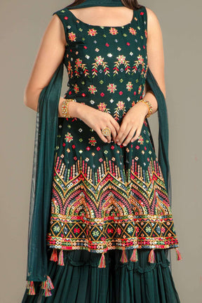 Bottle Green Georgette Peplum Gharara Suit.