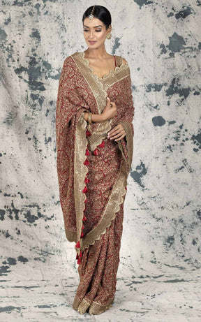 Maroon sequence work Georgette saree.